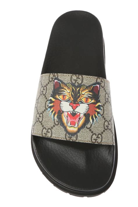 Gucci tiger head slides